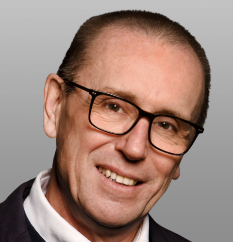 AQA CEO Colin Hughes Profile Picture